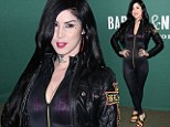 Kat Von D misfires at book signing by slipping into unflattering catsuit that exposes her leopard print bra 