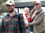 'It's all bulls***': Jack Osbourne denies allegations of parents' split but appears downcast as he steps out with wife Lisa Stelly and daughter Pearl