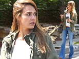 Fan of the flare! Jessica Alba is stylish and slim in a pair of Seventies-style bell-bottom jeans as she stocks up on fresh produce