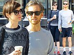 The couple that walks together, stays together: Anne Hathaway and her husband Adam Shulman take a stroll in Los Angeles 