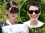Anne Hathaway shows off her growing locks... after her elfin crop tops poll of most influential onscreen hairstyles