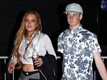 Let's hope he's a good influence! Rehab-bound Lindsay Lohan hits Coachella with her underage brother Cody