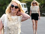 Britney Spears wears a short black skirt and heels to attend church Sunday near her home in Westlake Village, Ca. 