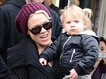 Family time: Pink and husband Carey Hart leave L'Avenue in Paris on Tuesday afternoon