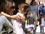 Hugs in the city! Sarah Jessica Parker and her daughter Tabitha share a tender embrace during routine school run 
