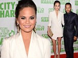 Christine Teigen and musician John Legend attend the City Harvest 19th Annual An Evening Of Practical Magic, Honoring Marc Murphy at Cipriani 42nd Street on April 16, 2013 in New York City