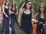 Victoria Beckham takes her kids to Six Flags theme park for a day 