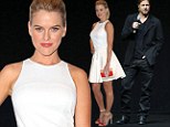 Alice Eve is angelic in white, while Brad Pitt shows off his rugged masculinity in all-black ensemble at CinemaCon