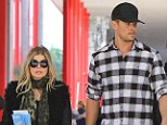 Fergie vamps it up in leather as she and husband Josh Duhamel enjoy a sunny couple's day out at the museum