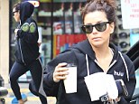 Desperately seeking perfection! Eva Longoria does not let rainy weather keep her from the gym