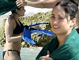 But as she pulled on a bikini and dove into the clear blue ocean in Barbados on Tuesday, the young singer was clearly loving her life.
