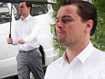 From Jack Dawson... to Jack Daniels! Leonardo DiCaprio braves the rain to shoot whiskey advert