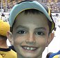 Tragic: Martin Richard, 8, was among the at least three people killed in the explosions at the finish line of the Boston Marathon
