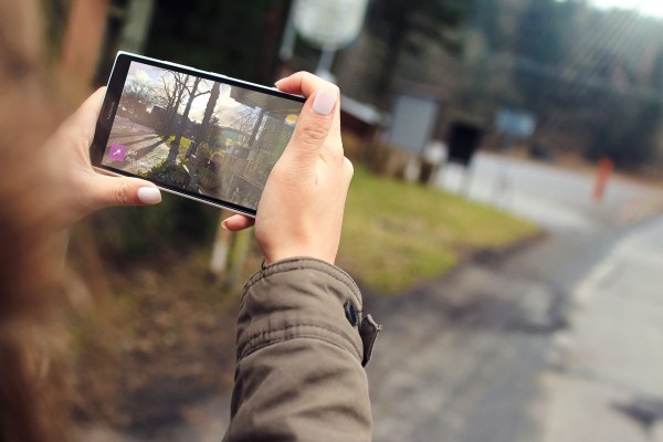 Picture of woman holding smartphone