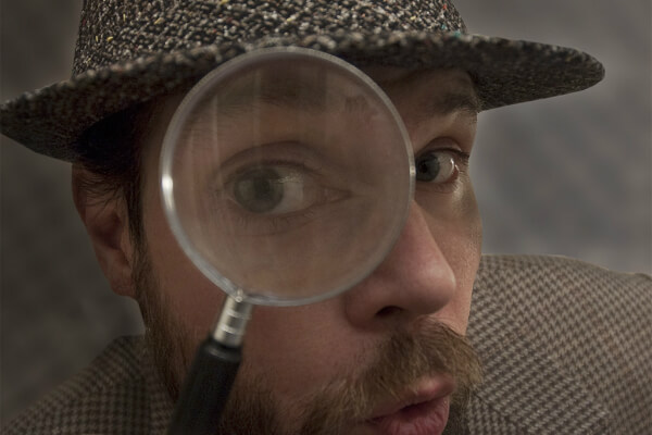 Detective with Magnifying Glass
