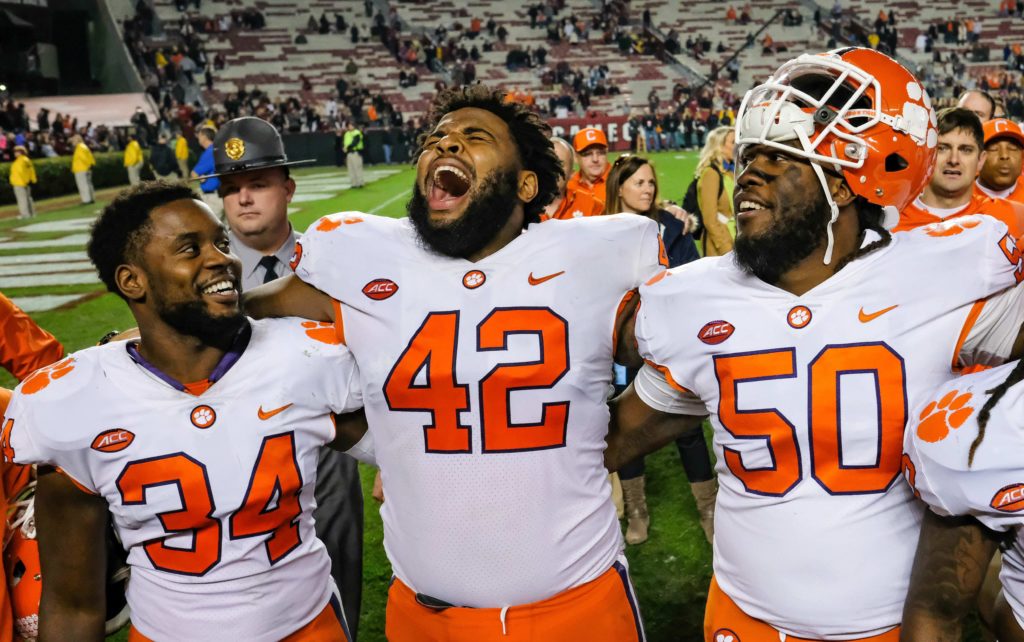 Badgers climb into College Football Playoff field