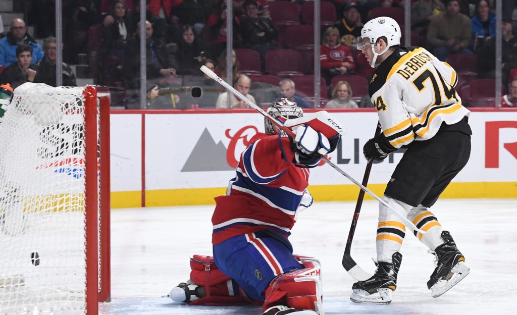 Canadiens Danault taken to hospital with head injury Canadiens Danault taken to hospital with head injury