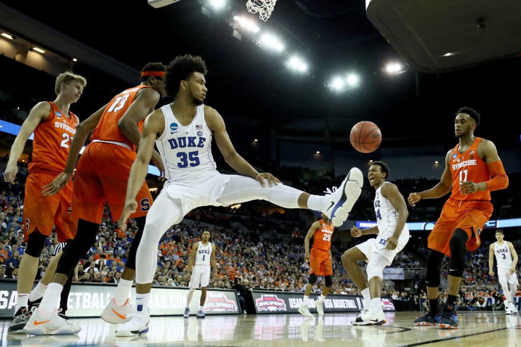 Kansas holds off Clemson to reach Elite Eight