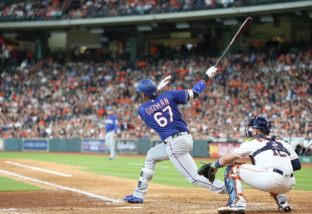 Rangers rally from 5-0 deficit to beat Astros