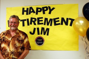 Jim Nelson jim with his retirement sign