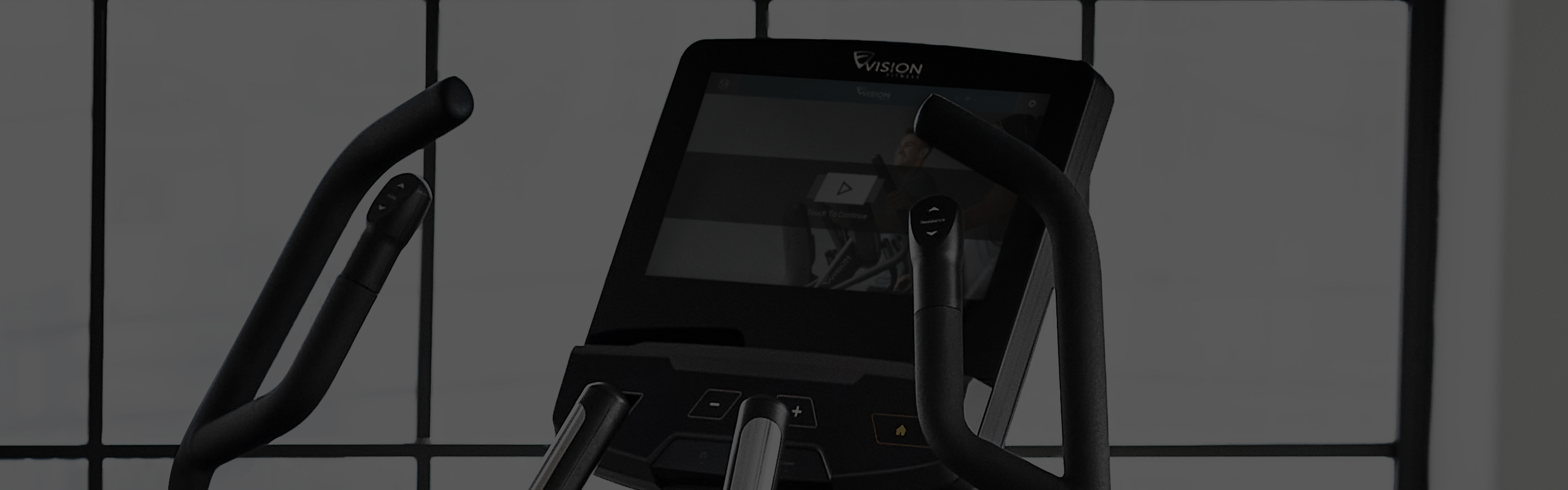 A dark close-up view of the entertainment console on a vision product