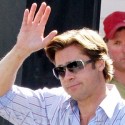 Brad Pitt Waves To The Photogs On Set
