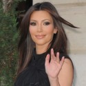 Kim K. Waves Hi In Paris