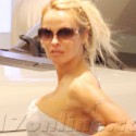Pamela Anderson Gives Dressing Down New Meaning