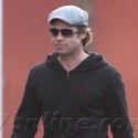Brad Pitt Flashes A Grin On Set