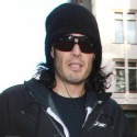 Russell Brand Keeps His Hands In His Pockets