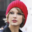 Taylor Swift Rocks A Red Hat For Fashion Week