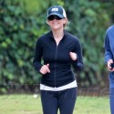 Reese Witherspoon Smiles While She Jogs