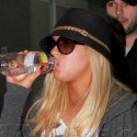 Xtina And Her Man At LAX