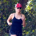Reese Holds On To Her Engagement Ring As She Jogs