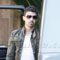 "Superstud" Joe Jonas Hangs By His Mercedes
