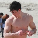 Lindsay's Little Bro Shows Off His Pecs!