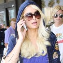 Paris Hilton Looks Hot In Blue Sweats At LAX