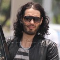 Russell Brand Wears A Leather Jacket In The Florida Heat