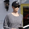 Charlize Theron Styles Her Hair