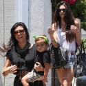 Kourtney And Kendall Run Across The Street With Mason