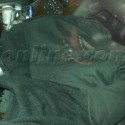 Lindsay Lohan Hides Under A Jacket
