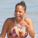 Christian Milian Hits The Beach With Pals