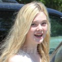 Elle Fanning Shops In White