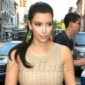 Kim Kardashian Glitters Like Gold