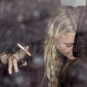 Mary-Kate Olsen Smokes In Back of SUV