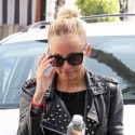Nicole Richie Hides Odd Tan And Possible Boob Job