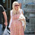 Tori Spelling Clutches On To A Stuffed Chicken