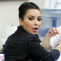 Kim Kardashian Wears A Bun And Gets Her Nails Done