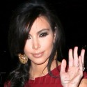 Kim Kardashian Looks Red Hot