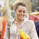 Miley Cyrus Loads Up On Junk Food